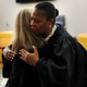 State District Judge Tammy Kemp gives former Dallas Police Officer Amber Guyger a hug before Guyger leaves for jail Oct. 2, 2019, to start a 10-year sentence for murdering an unarmed black man, Botham Jean, in his Dallas apartment.